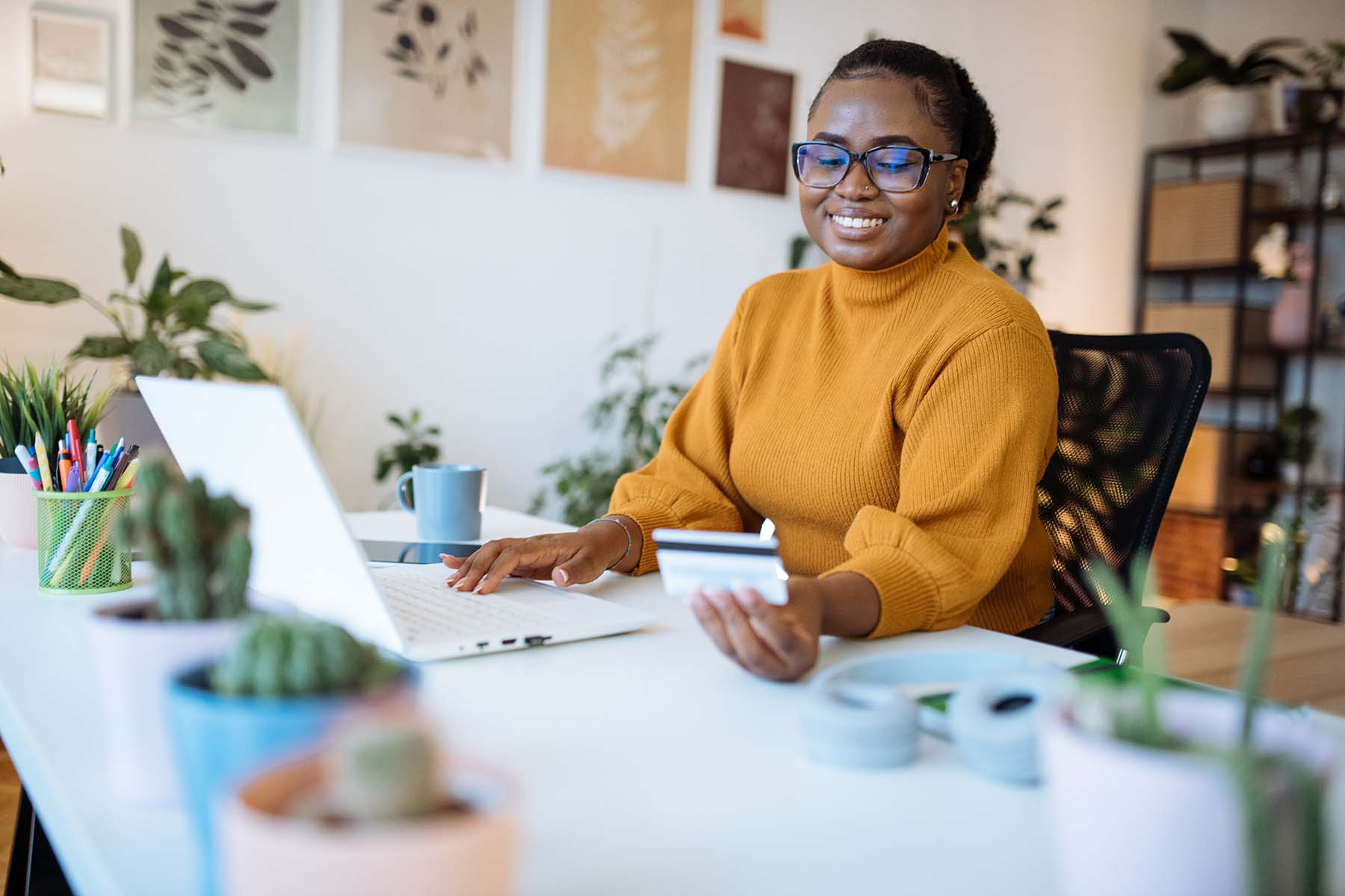 Woman shopping online with credit card