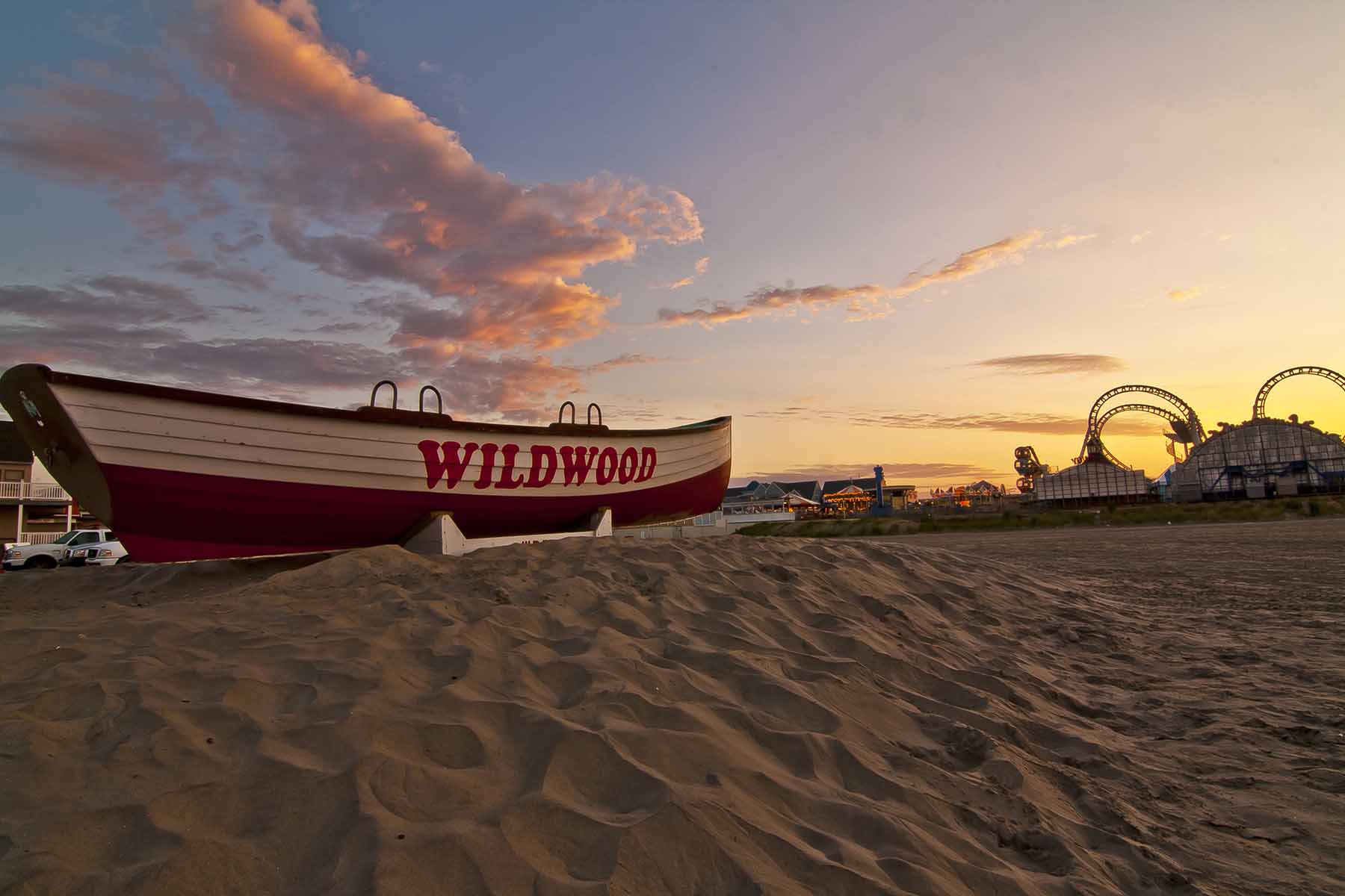 Early morning on one of the beaches in Wildwood, NJ with amusement park in the background