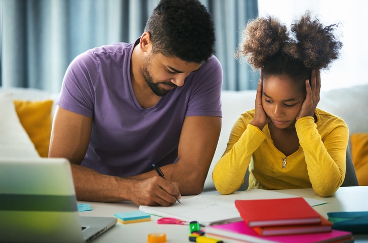 kid getting help with studies