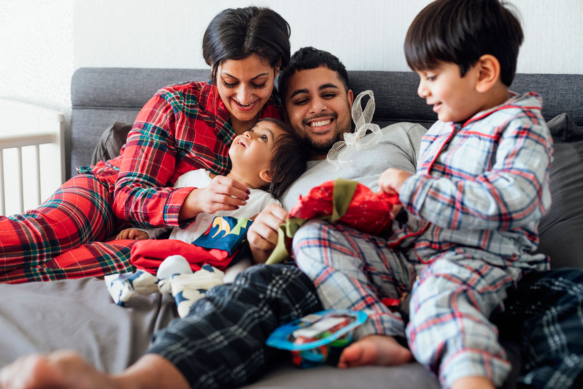 family on the couch at christmas