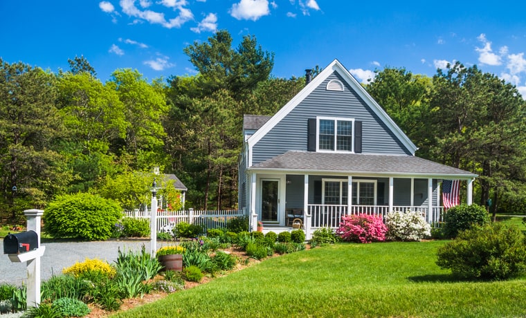 house with porch and green front yard