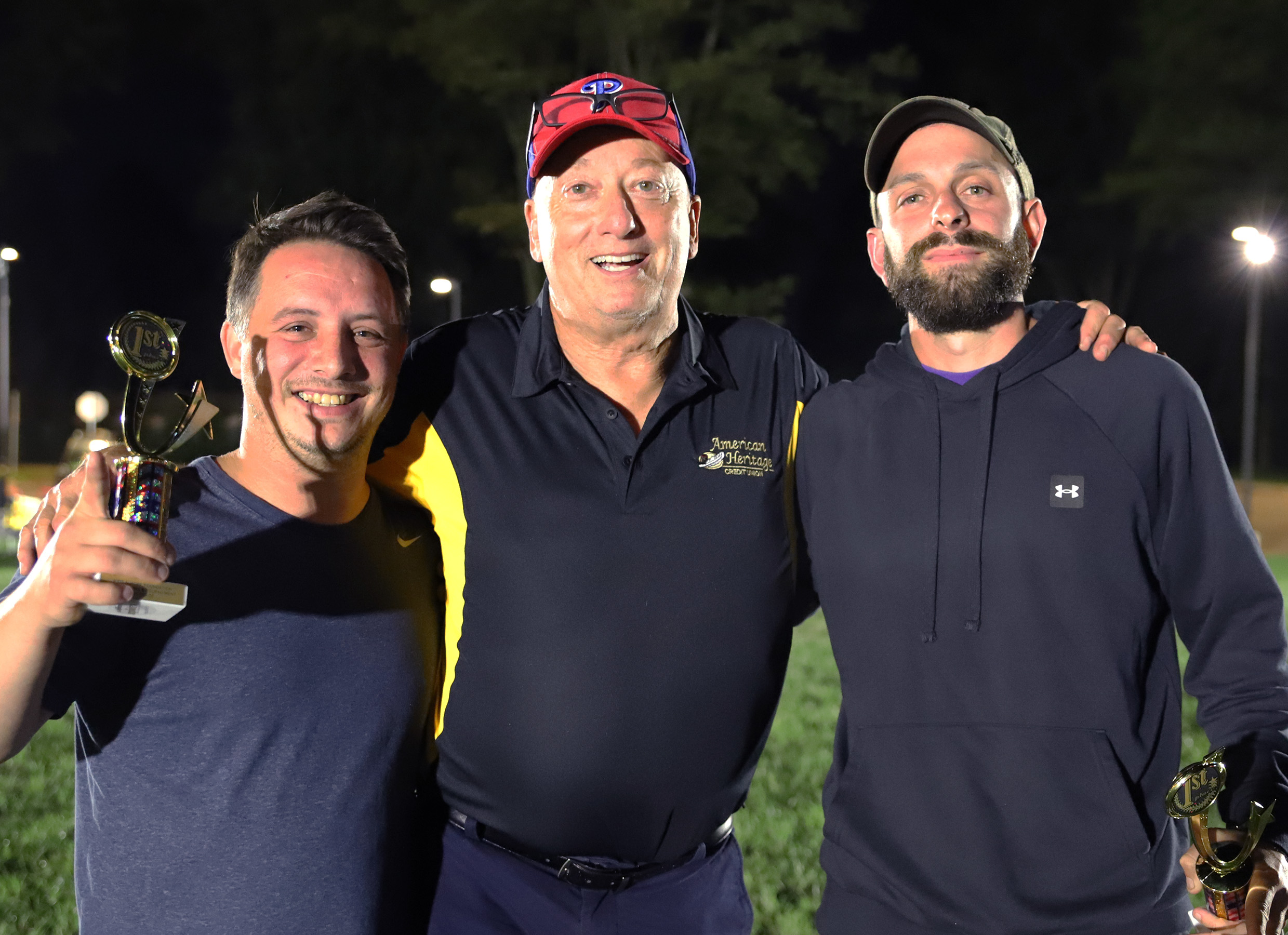 Bruce Foulke presented the “Smokin Moes,” Nicholas Leeper and John Sharpe, with a cash prize and first place trophies.