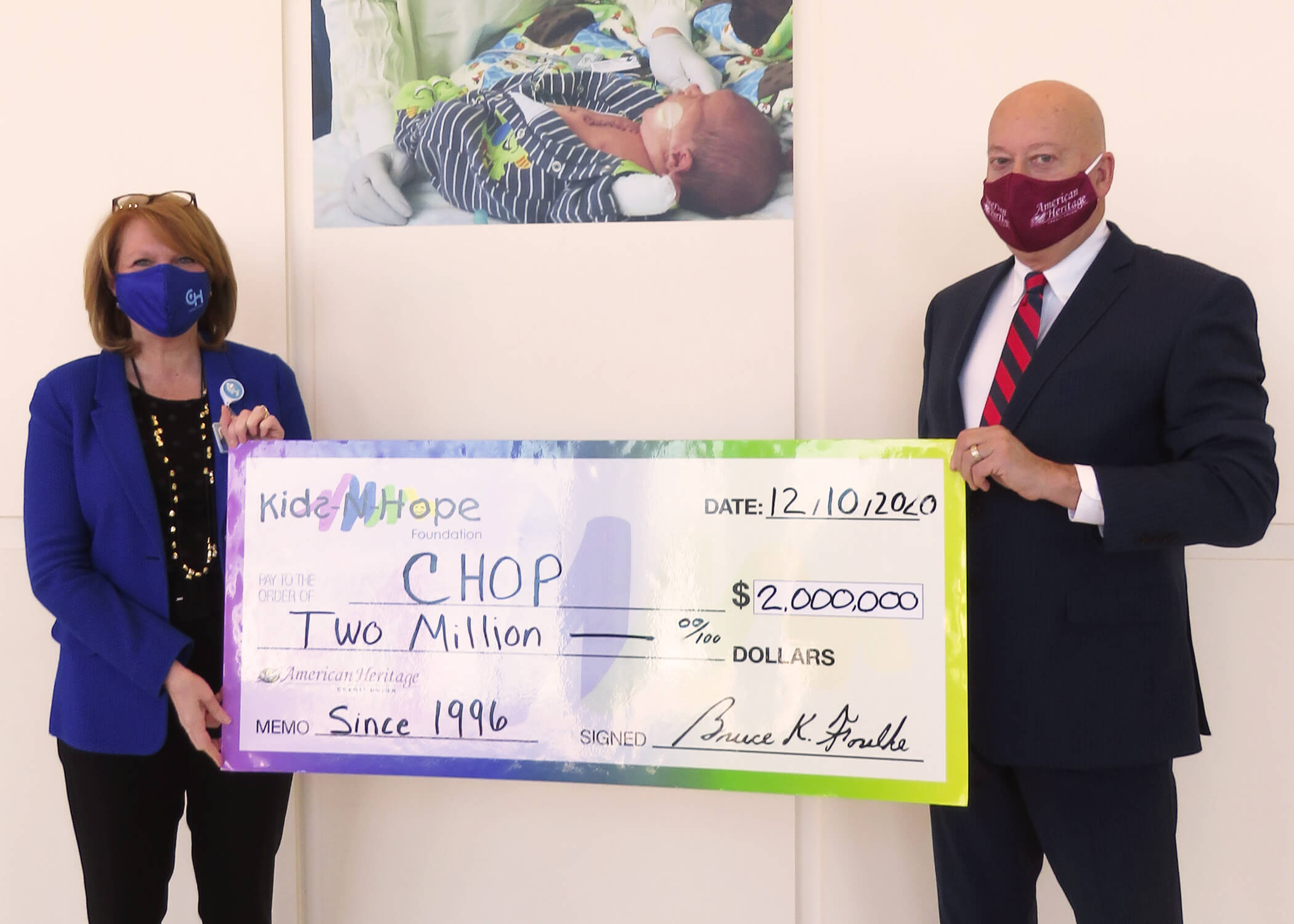 Bruce K. Foulke, Chairman of the Kids-N-Hope Foundation, presents a contribution representing $2 million in cumulative donations to Children’s Hospital of Philadelphia President & CEO, Madeline Bell.