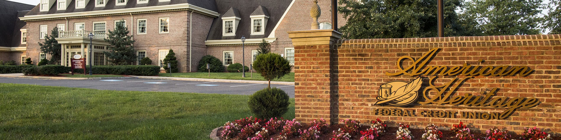 American Heritage building behind sign