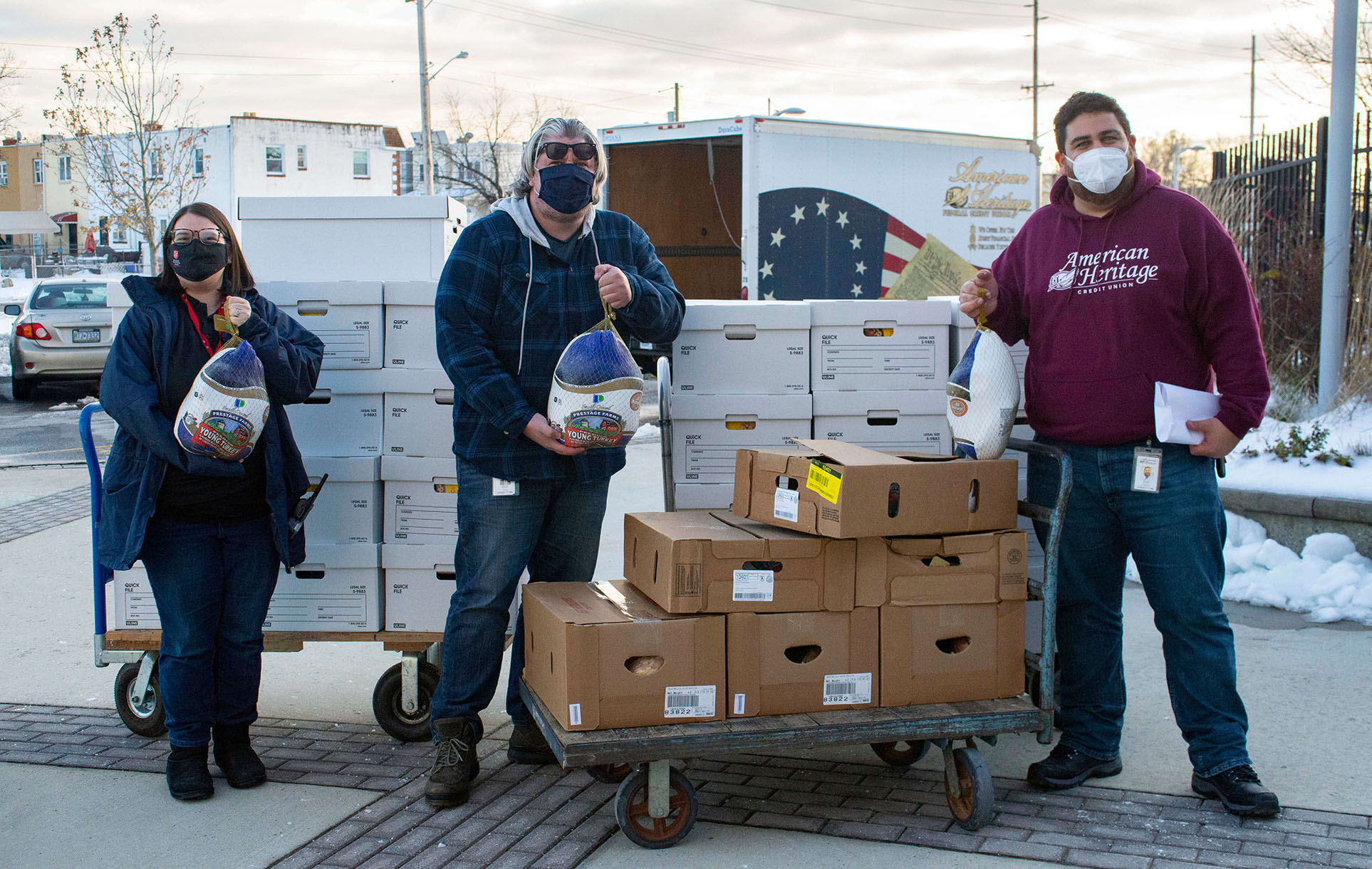 American Heritage Credit Union associates continue the Spirit of Giving initiative by contributing non-perishable food boxes, turkey and ham dinners as well as additional monetary donations to over 250 families in need in the Philadelphia area.